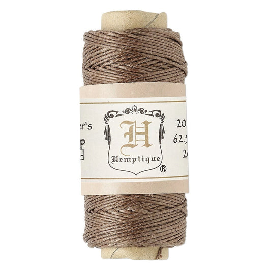 A spool of Hemptique embroidery thread in a warm taupe-brown color, wound on a light tan cardboard core with a cream paper label band.