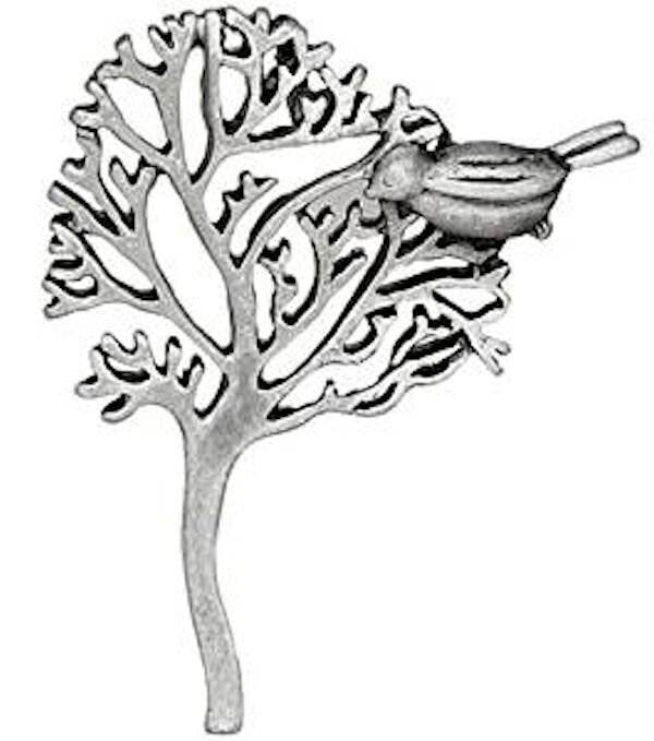 Silver tree design and a bird perched on a branch.