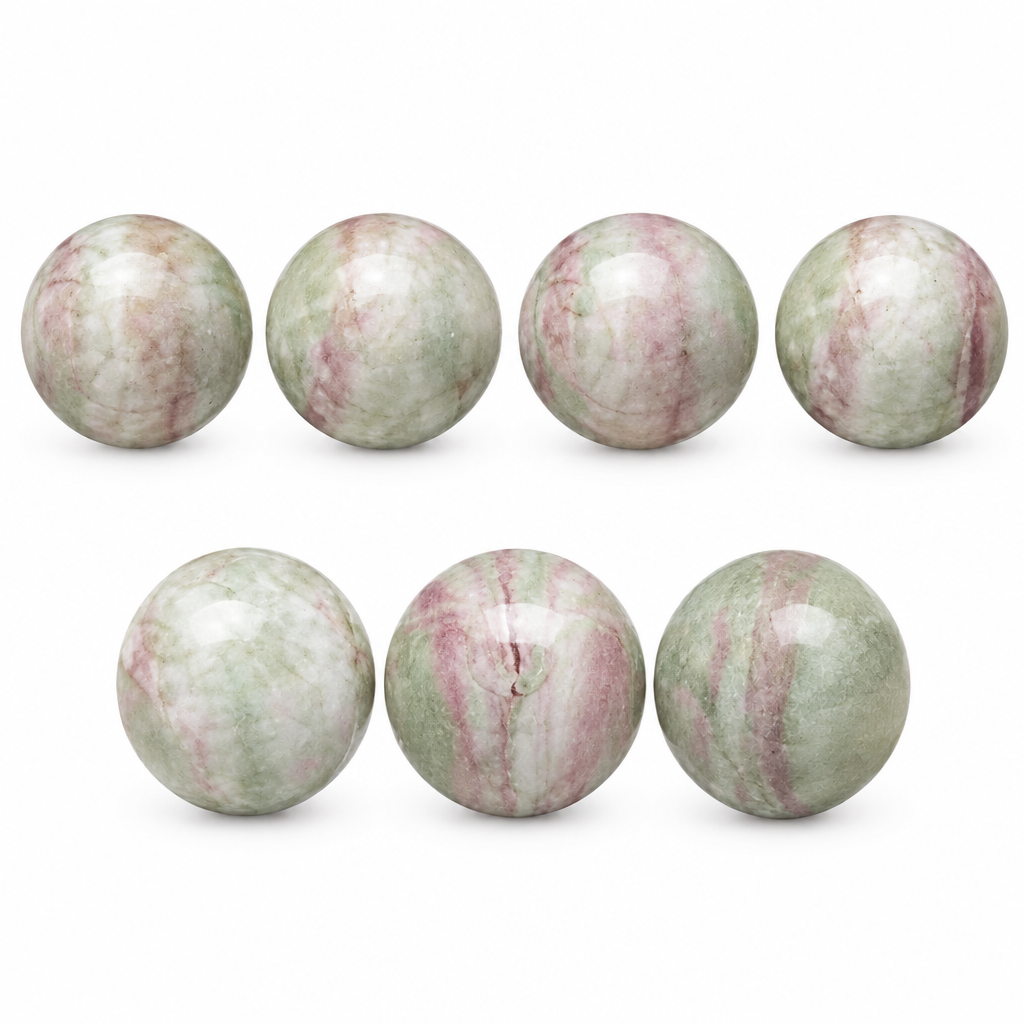 Six polished round stone beads with a marbled pattern of pale green, white, and pinkish tones, arranged in two rows of three on a plain white background.
