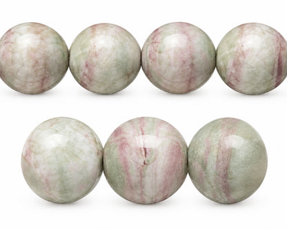 A string of large round beads with a marbled pattern of pale pink, green, and white, displayed on a white background with the text 'The Mystical Garden Path' underneath.