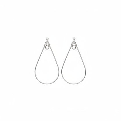 A pair of silver teardrop-shaped dangle earrings with a spring ring clasp, shown on a plain white background.