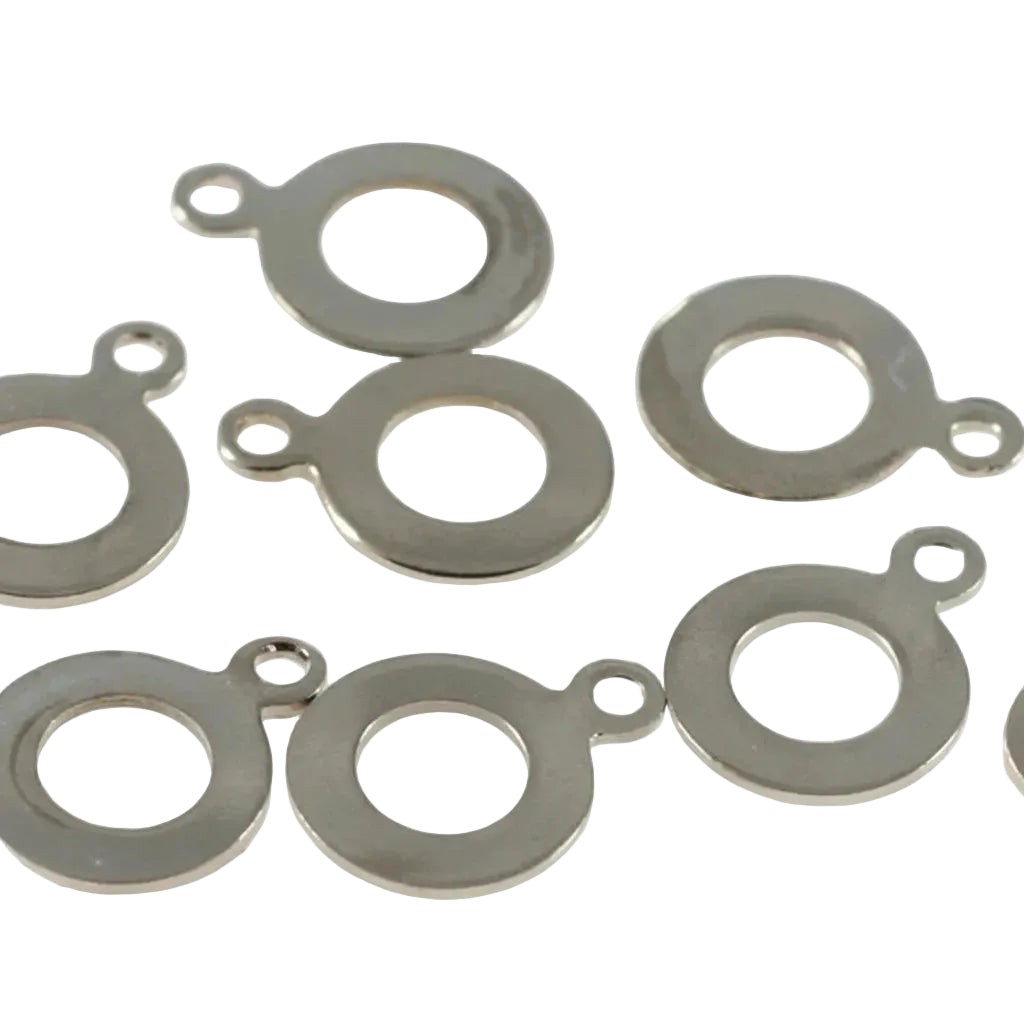 Nine silver metal split ring jump rings with small attachment loops, arranged on a plain white background.