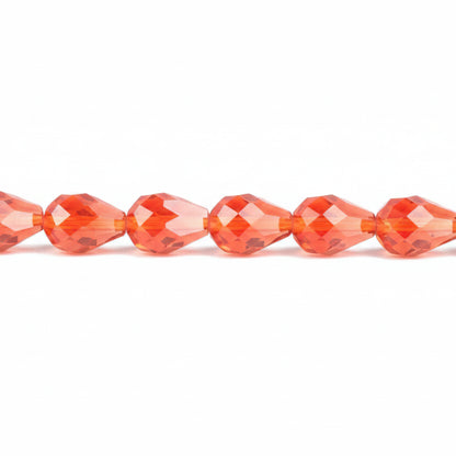 Faceted round beads in a vibrant orange-red color, shown in a horizontal line on a plain white background.