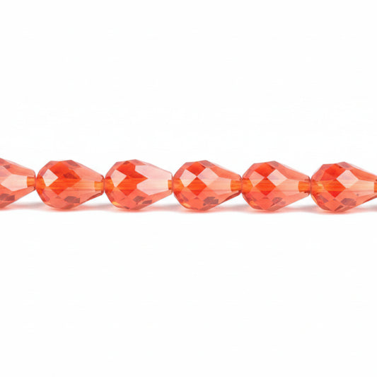 Faceted round beads in a vibrant orange-red color, shown in a horizontal line on a plain white background.