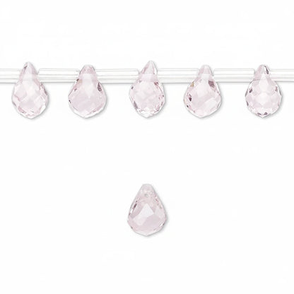 Five faceted light pink teardrop-shaped beads strung on a clear cord, with one matching bead shown below on a plain white background.
