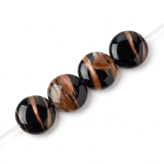 Close-up of round black beads with metallic gold and bronze streaks, shown against a plain white background.