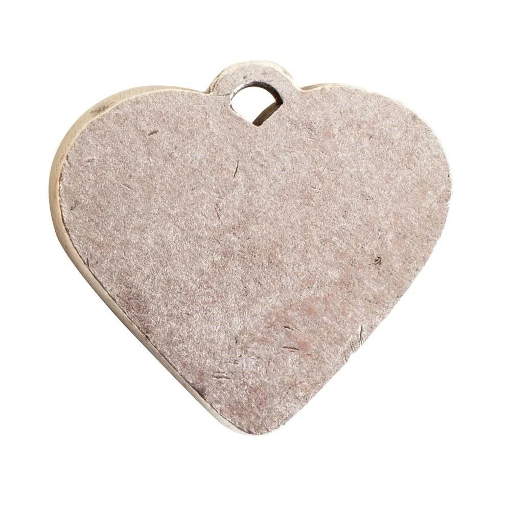 A blank, heart-shaped wooden tag with a small hole at the top for hanging, shown on a solid white background.