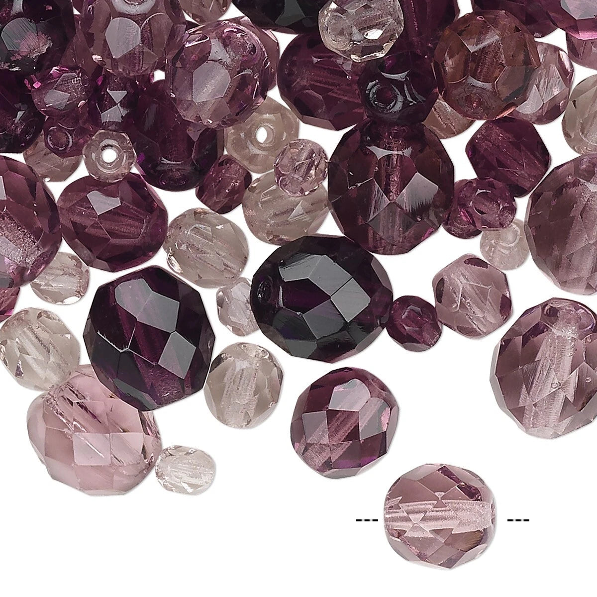A pile of faceted glass beads in various sizes and colors, including deep plum purple, dusty rose pink, and translucent clear beads, shown on a white background with a size reference line at the bottom right.