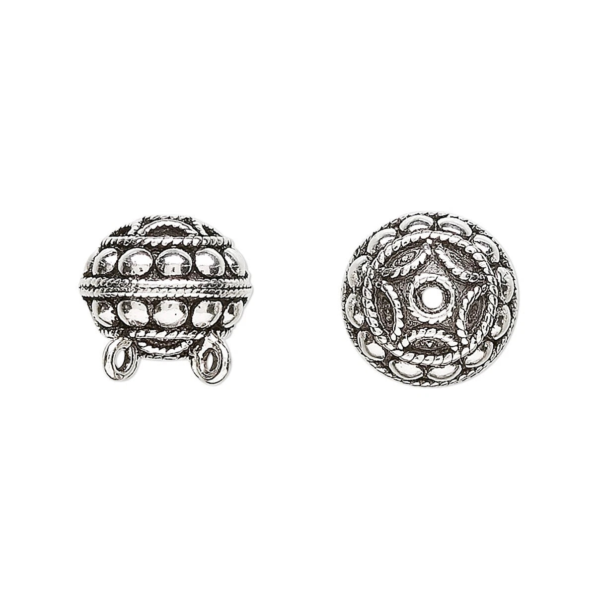 Two silver-toned ornate beads shown on a plain white background, one displaying the front with hanging loops and the other showing the detailed top view.