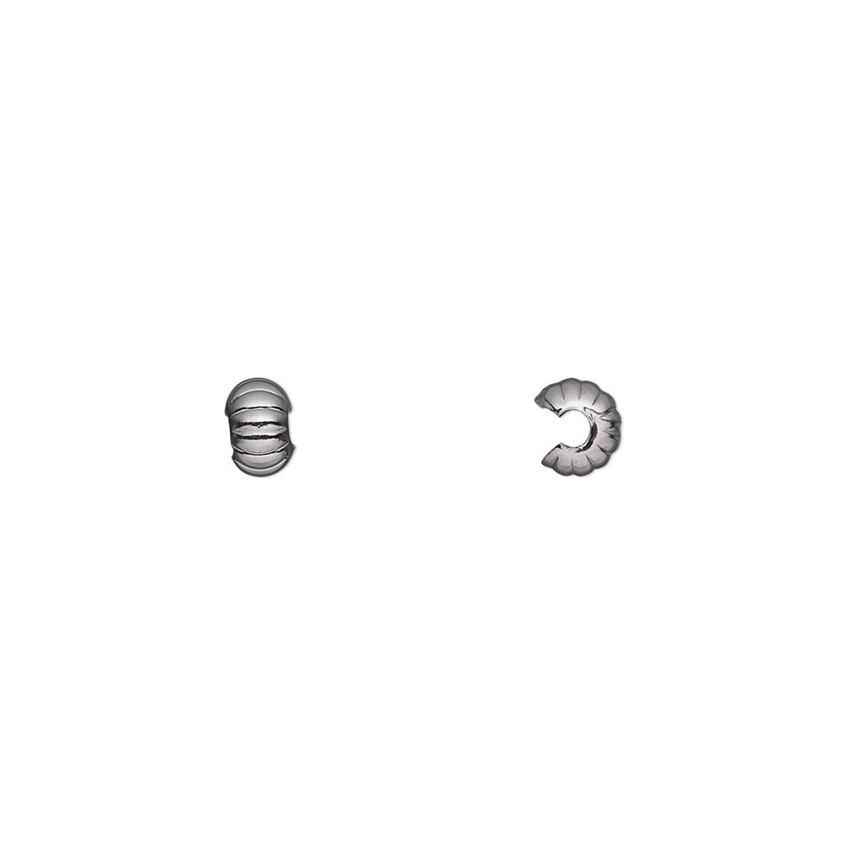 A pair of silver-toned metal spacer beads, one oval with horizontal ridges and the other a curved hook shape, shown on a plain white background.