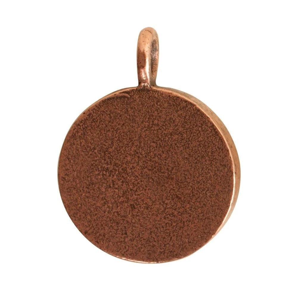 A round copper pendant charm with a textured matte finish and a small integrated loop at the top, shown on a plain white background.