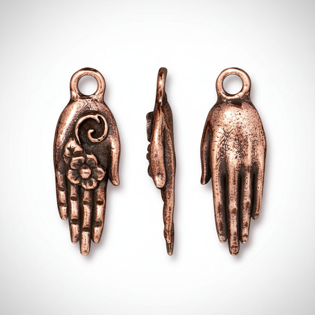 Three views of a copper Hamsa hand charm pendant on a white background, showing the front, side, and back details.