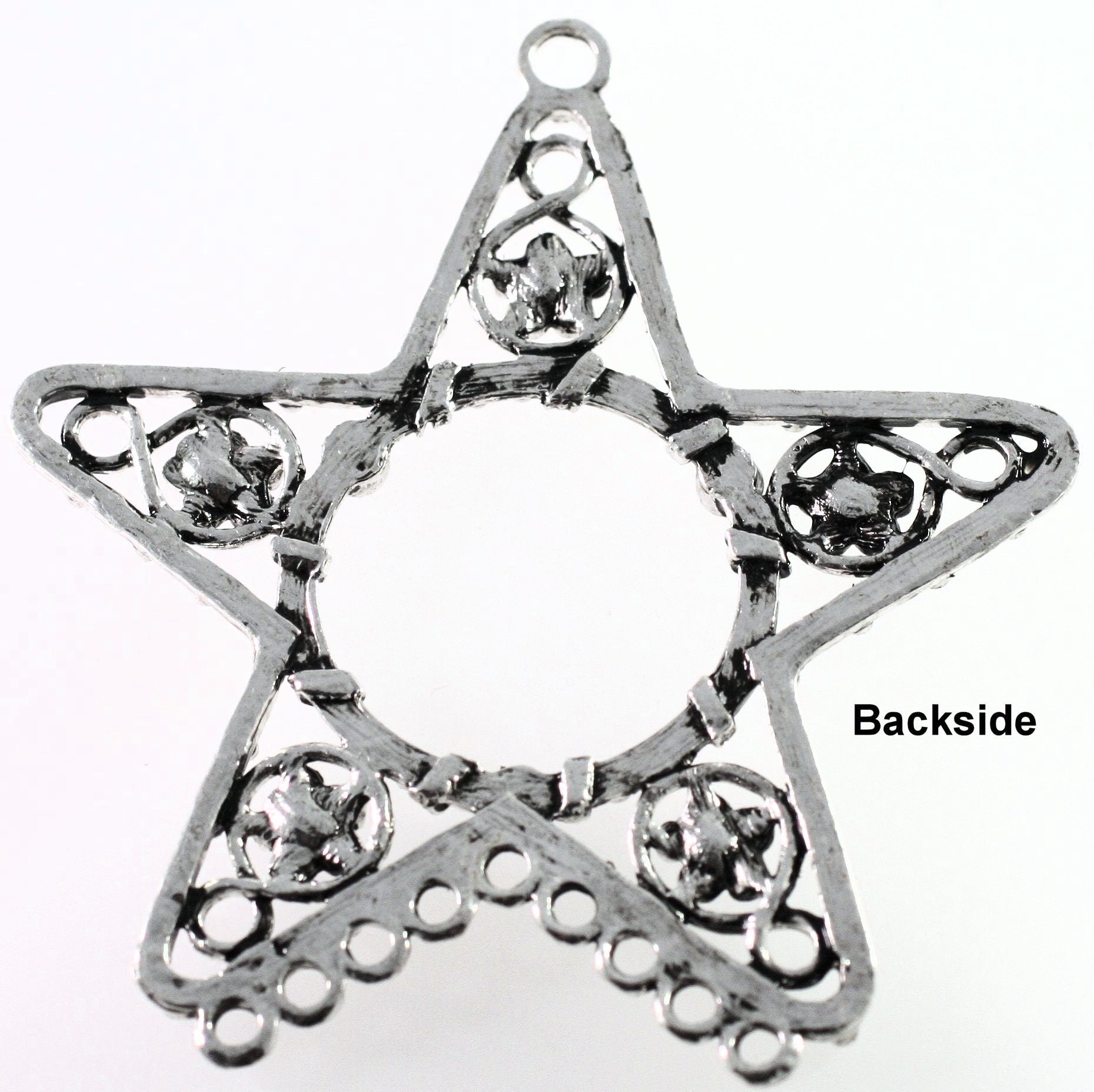 Star-shaped metal pendant with embedded crystals on a white background