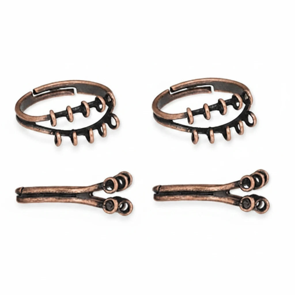 Four antique bronze spiral ear cuffs arranged in two pairs on a plain white background.