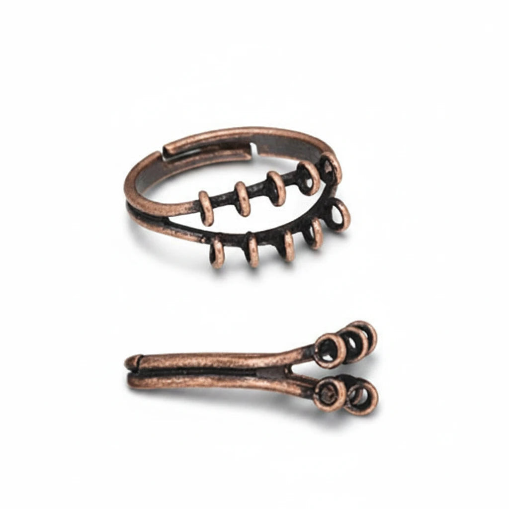 An antique bronze metal jewelry finding, shown in two views: a coiled ring clasp at the top and a matching spring bar at the bottom, both on a plain white background.