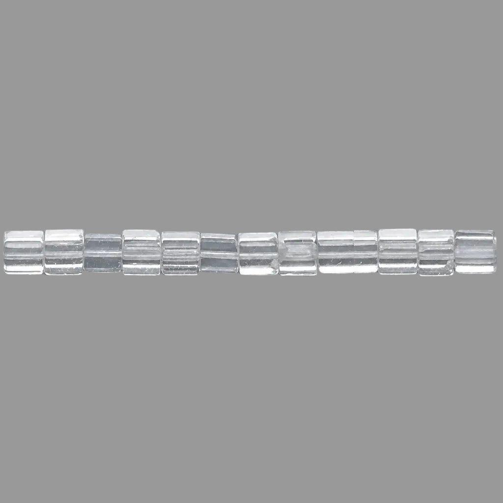 A close-up of a strand of clear, SQUARE beads aligned horizontally against a solid gray background.