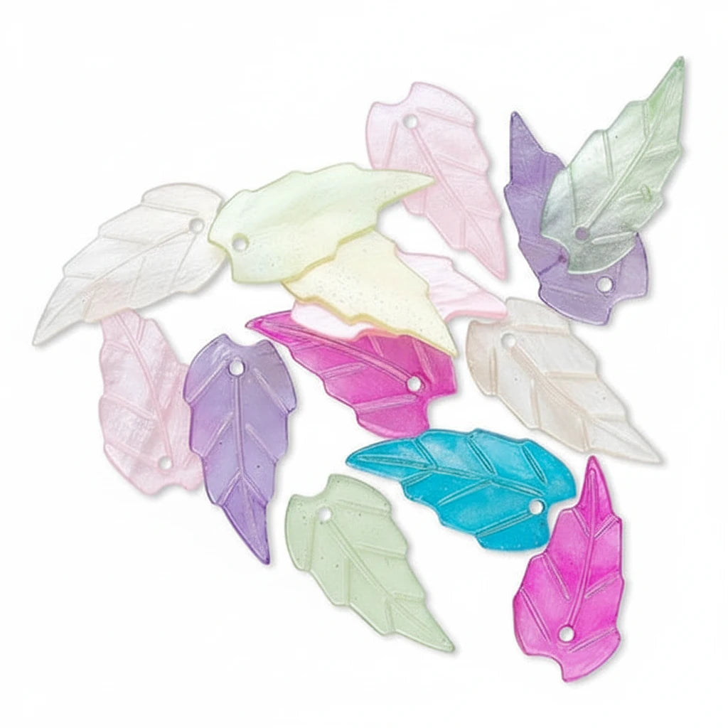 A set of translucent acrylic leaf-shaped beads in various pastel colors including pink, purple, blue, green, and pale yellow, arranged on a plain white background.