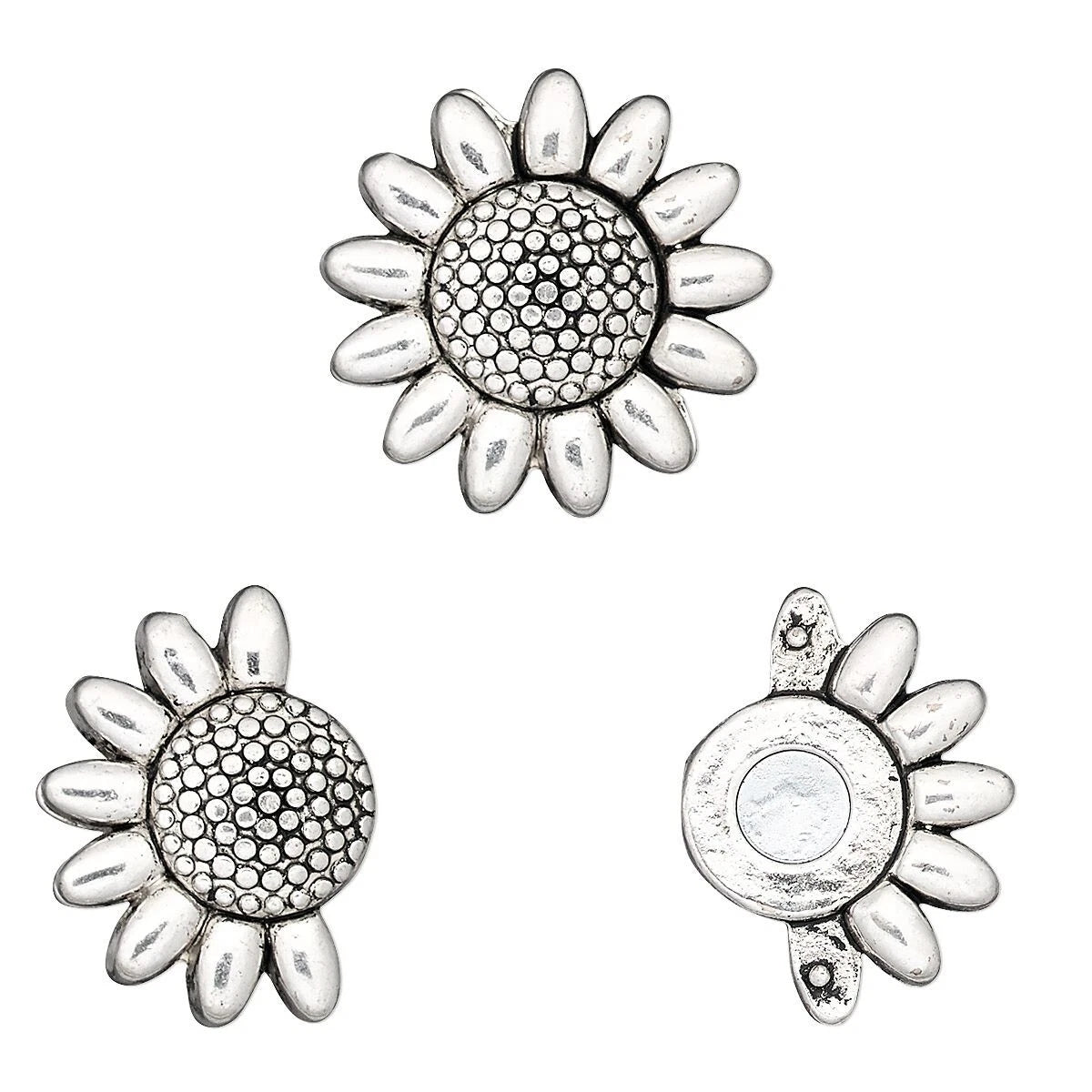 Three views of a silver-toned sunflower-shaped jewelry finding or charm on a plain white background, showing the front textured face, the back with a circular recess, and a side profile.