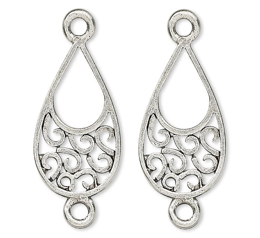 A pair of silver teardrop-shaped filigree charms with decorative scrollwork and circular loops at the top and bottom, shown on a plain white background.