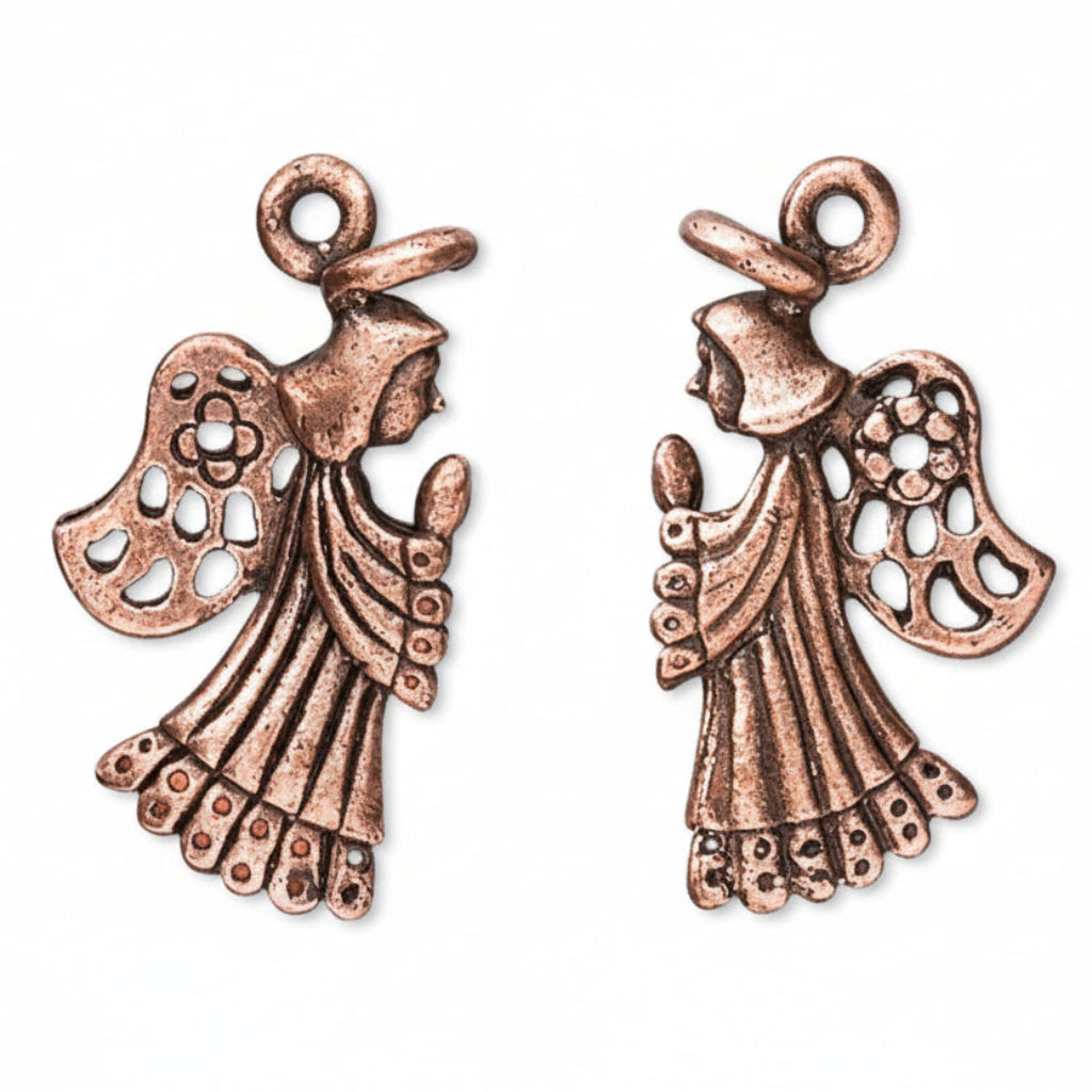 A pair of antique bronze angel charms with intricate cutout details and hanging loops, displayed on a clean white background.