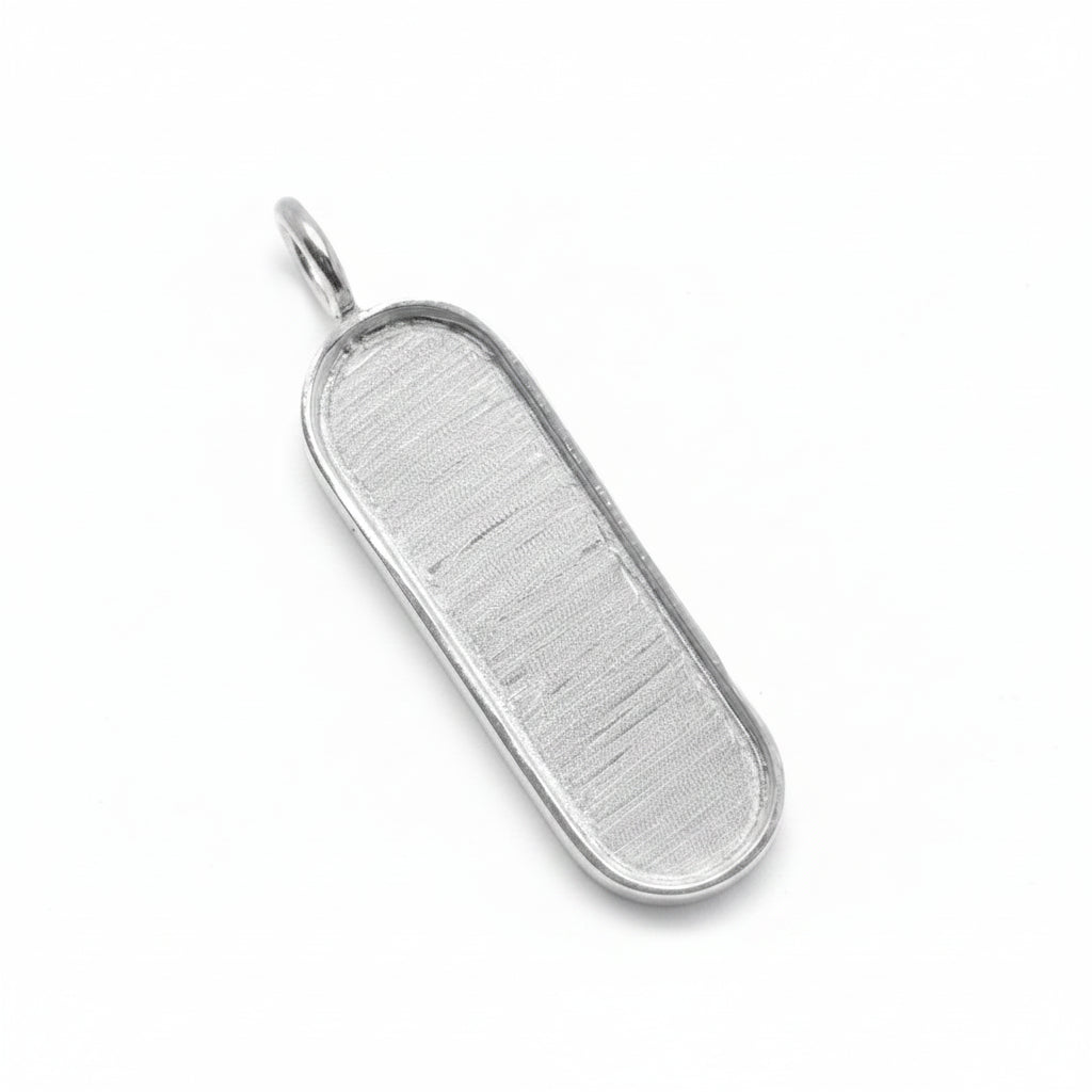 A silver oval pendant with a brushed metallic texture and a polished border, featuring a small integrated loop at the top, shown on a plain white background.