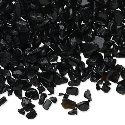 Black pebbles on a white background