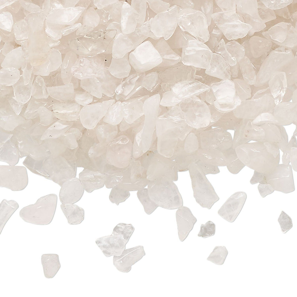 White crystal salt or bath salts granules piled on a white background, with a few pieces scattered in front.
