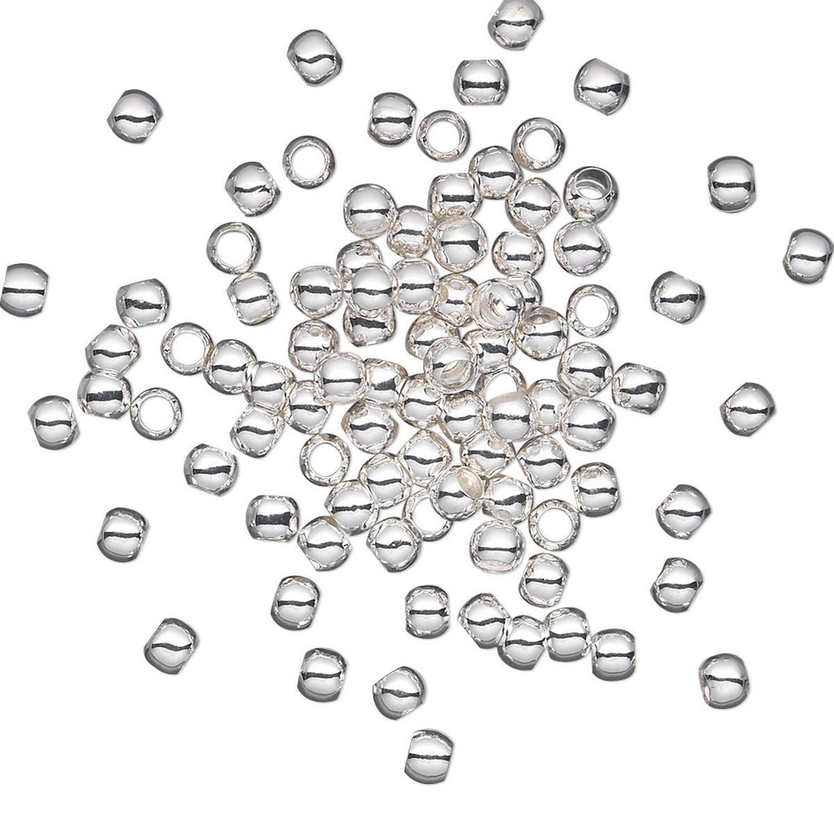 A pile of small, shiny silver glass seed beads with a flat top and loop on the side, scattered on a plain white background.