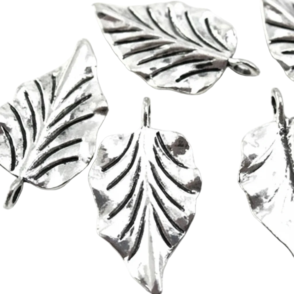 Several silver-toned leaf-shaped jewelry charms with textured veining and hanging loops, shown on a plain white background.