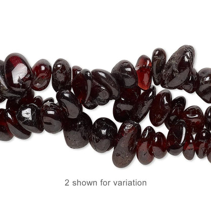Dark red polished gemstone beads arranged in two strands on a white background, with the text '2 shown for variation' below.