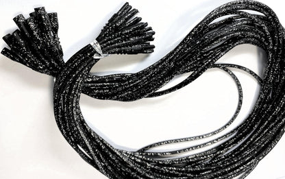 Black braided cords on a white background