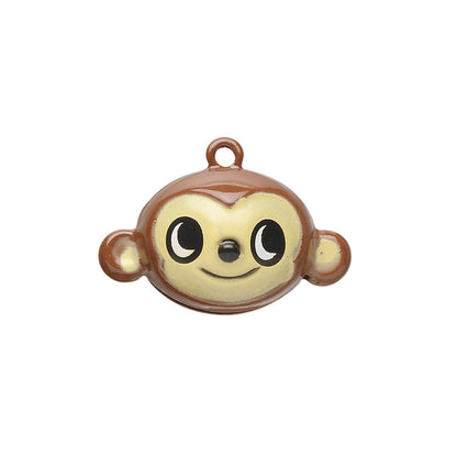 small monkey-shaped jingle bells in brown and cream, shown on a plain white background.