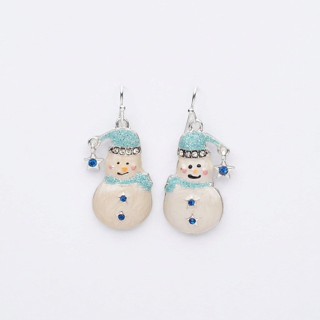 A pair of snowman-shaped dangle earrings with glittery light blue hats and scarves, silver hooks, and small blue rhinestone accents on a plain white background.