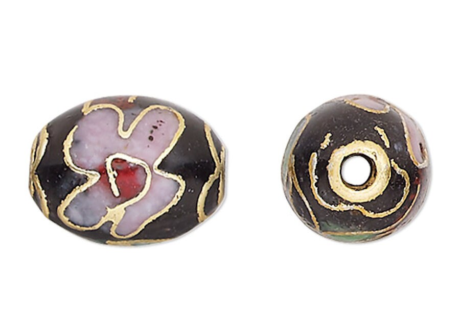 Two decorative beads with floral patterns on a white background