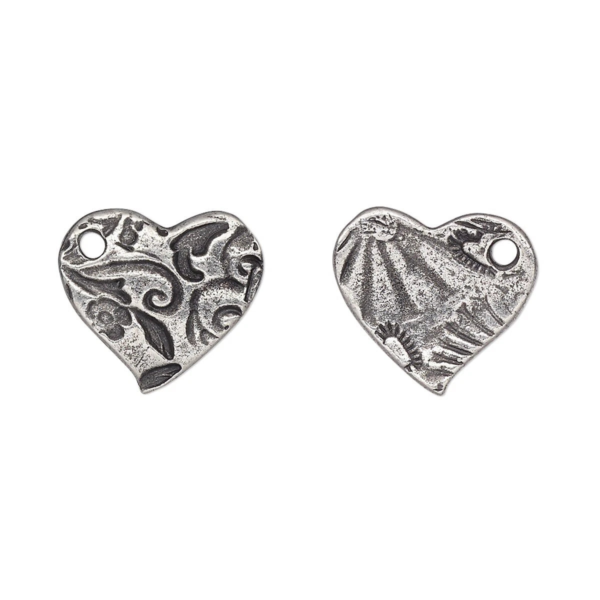 Two silver heart-shaped charms with textured, antiqued finishes and small hanging loops, displayed side by side on a plain white background.