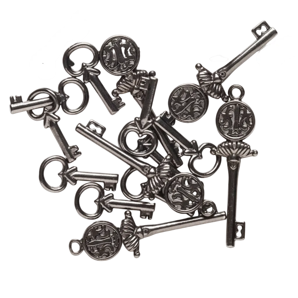 A pile of antique-style metal key charms with ornate circular medallions and decorative heads, arranged on a plain white background.