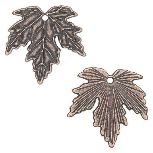 Two bronze-colored metal leaf-shaped charms with pre-punched holes, displayed on a clean white background.