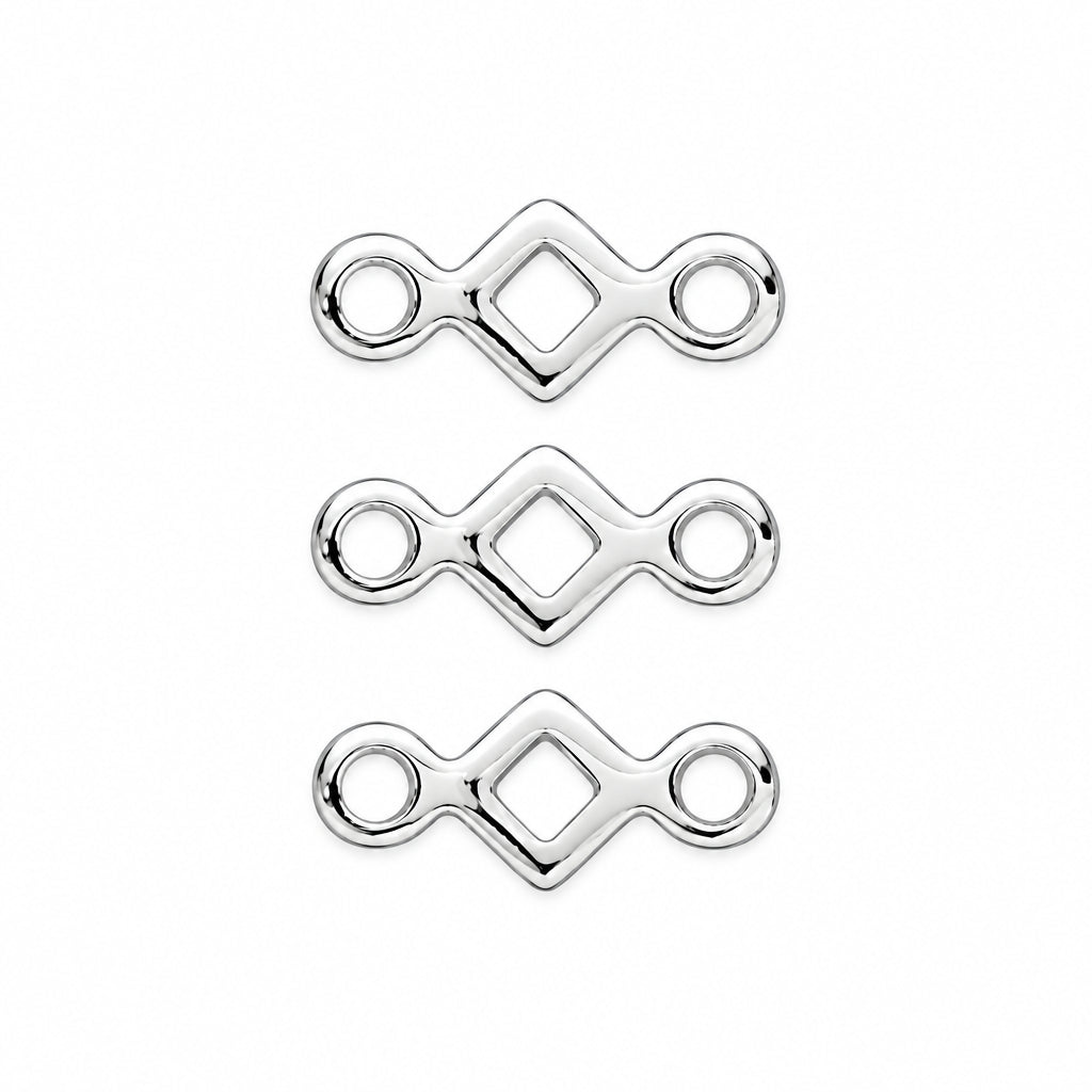 Three silver-toned metal connector charms with oval side loops and a central diamond-shaped cutout, arranged vertically on a white background.