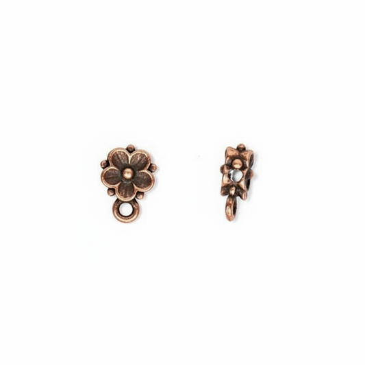 COPPER BEADS with vertical slats on a white background