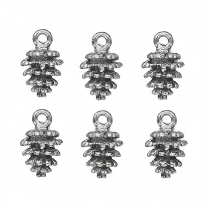 silver pine cone charms with a textured, antiqued finish, arranged on a plain white background.