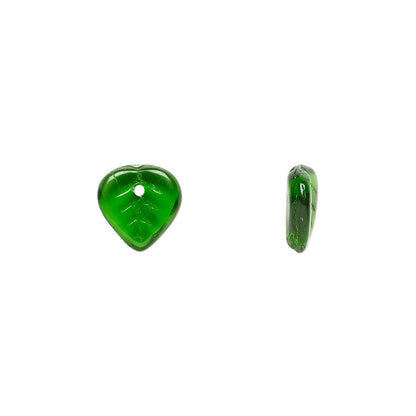 Two green heart-shaped beads on a white background