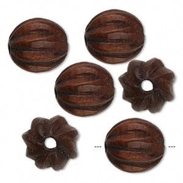 Five dark brown wooden beads, including three oval ribbed beads and two flower-shaped open-end beads, arranged on a plain white background.