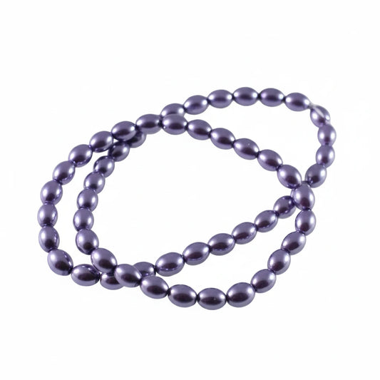 A strand of glossy, oval-shaped beads in a metallic lavender-purple color, coiled on a plain white background.