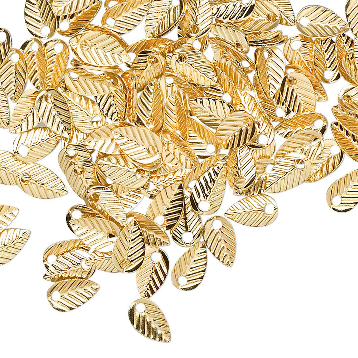 A pile of gold-colored metal leaf charms with a textured, ribbed surface and a small hole at the top, scattered on a plain white background.
