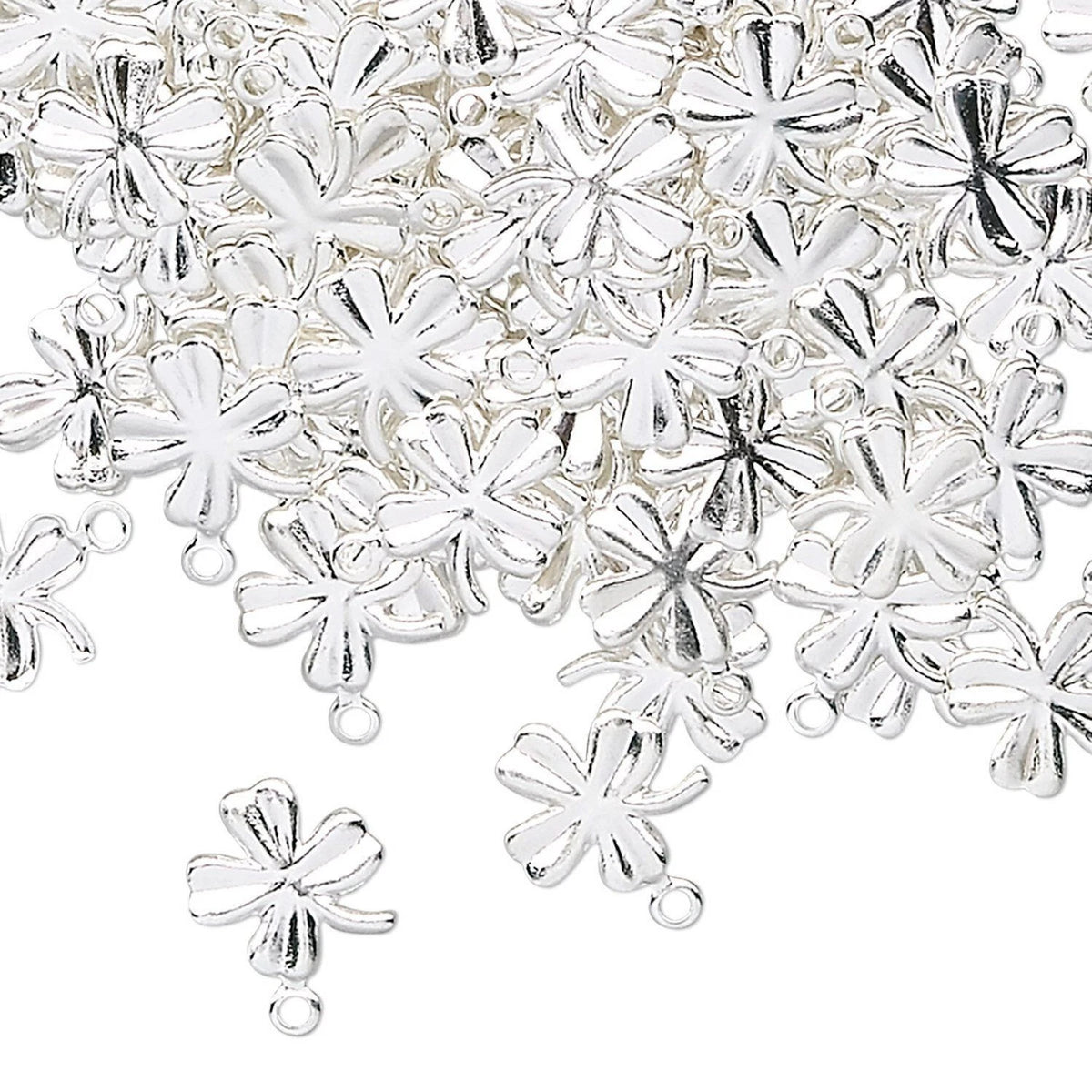 A pile of silver-toned metal flower-shaped charms with small loops at the bottom, shown on a plain white background.