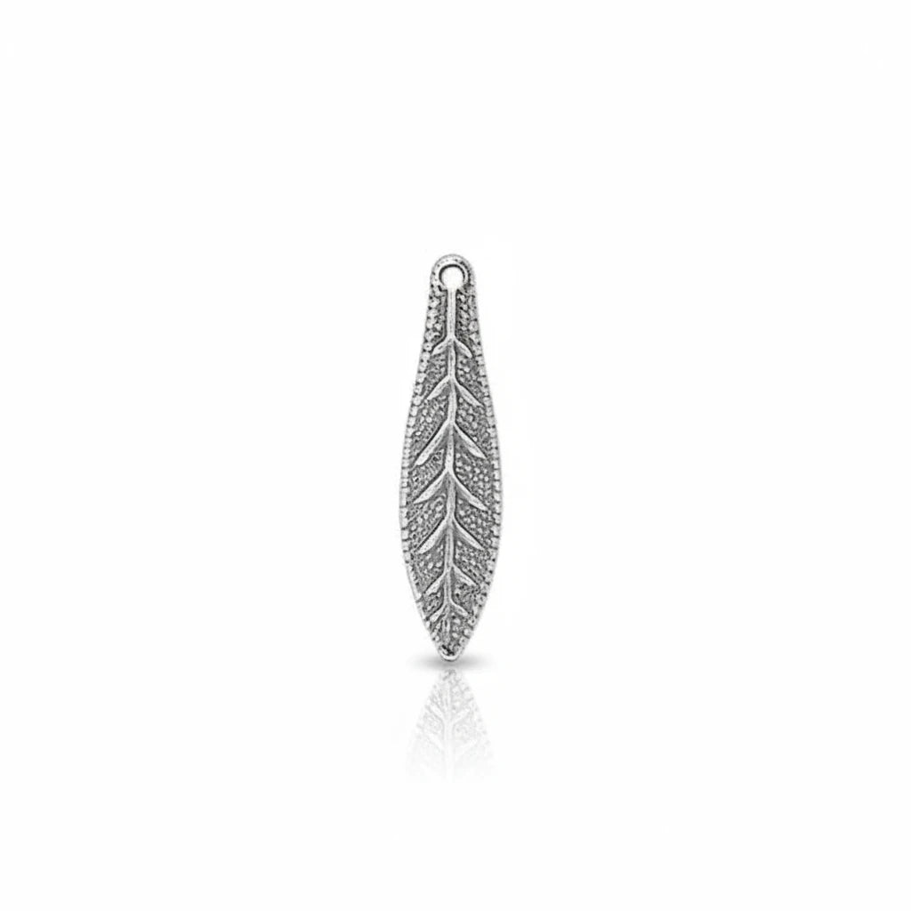 A silver-toned leaf-shaped jewelry charm with an openwork leaf design and a small loop at the top, shown on a plain white background.