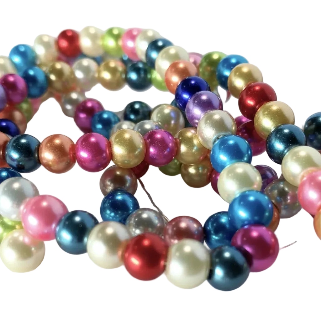 A close-up of strands of shiny, iridescent round beads in multiple colors including blue, pink, purple, gold, red, green, and white, arranged on a light surface.