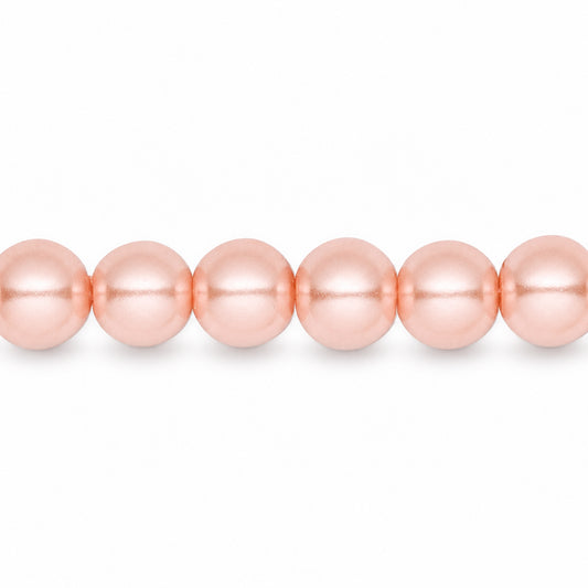 A close-up horizontal row of glossy, peach-pink round beads on a plain white background.