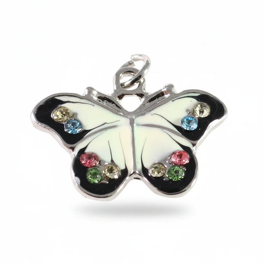 A silver butterfly-shaped pendant charm with black and white enamel wings, decorated with small multicolored rhinestones, on a plain white background.