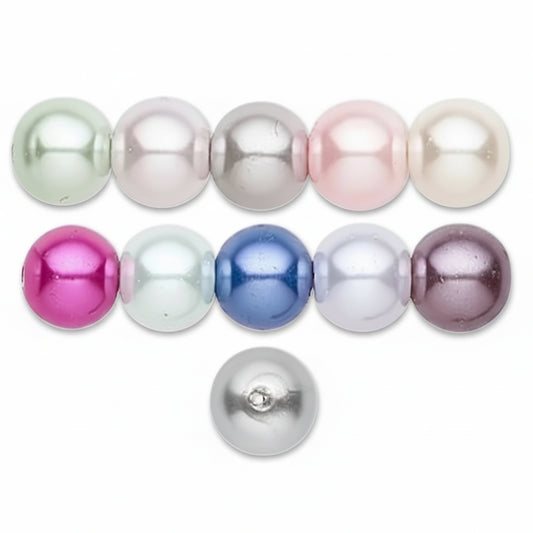 Round pearl beads in assorted pastel and metallic colors, including mint green, pale pink, silver, magenta, light blue, royal blue, lavender, and a separate silver bead shown below on a white background.